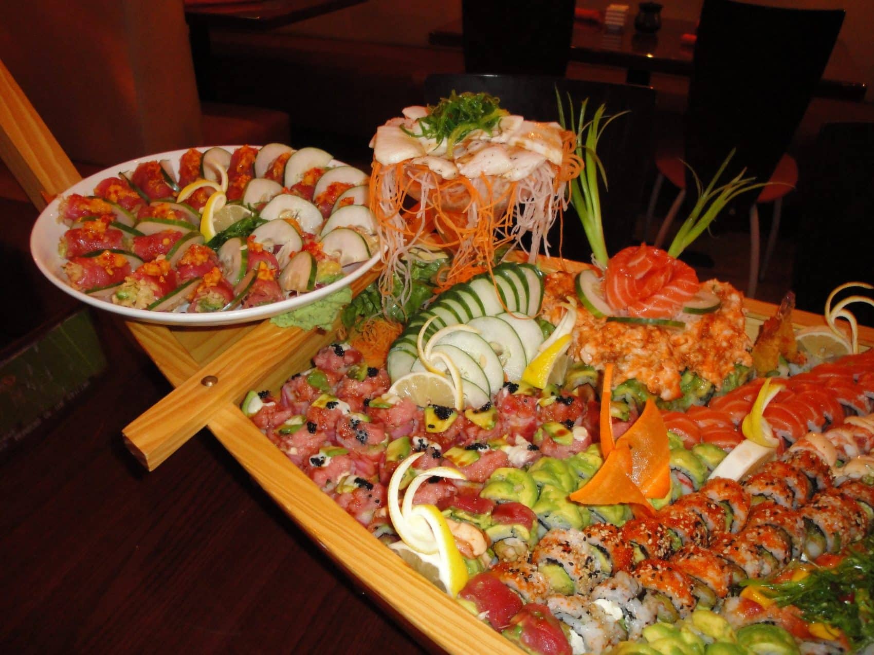 Sushi and sashimi boat with appetizers from Rise Sushi